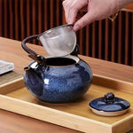 Japanese kiln-glazed porcelain tea set with 6 dark blue cups and teapot with filter, crafted by TEMU for elegant tea drinking.