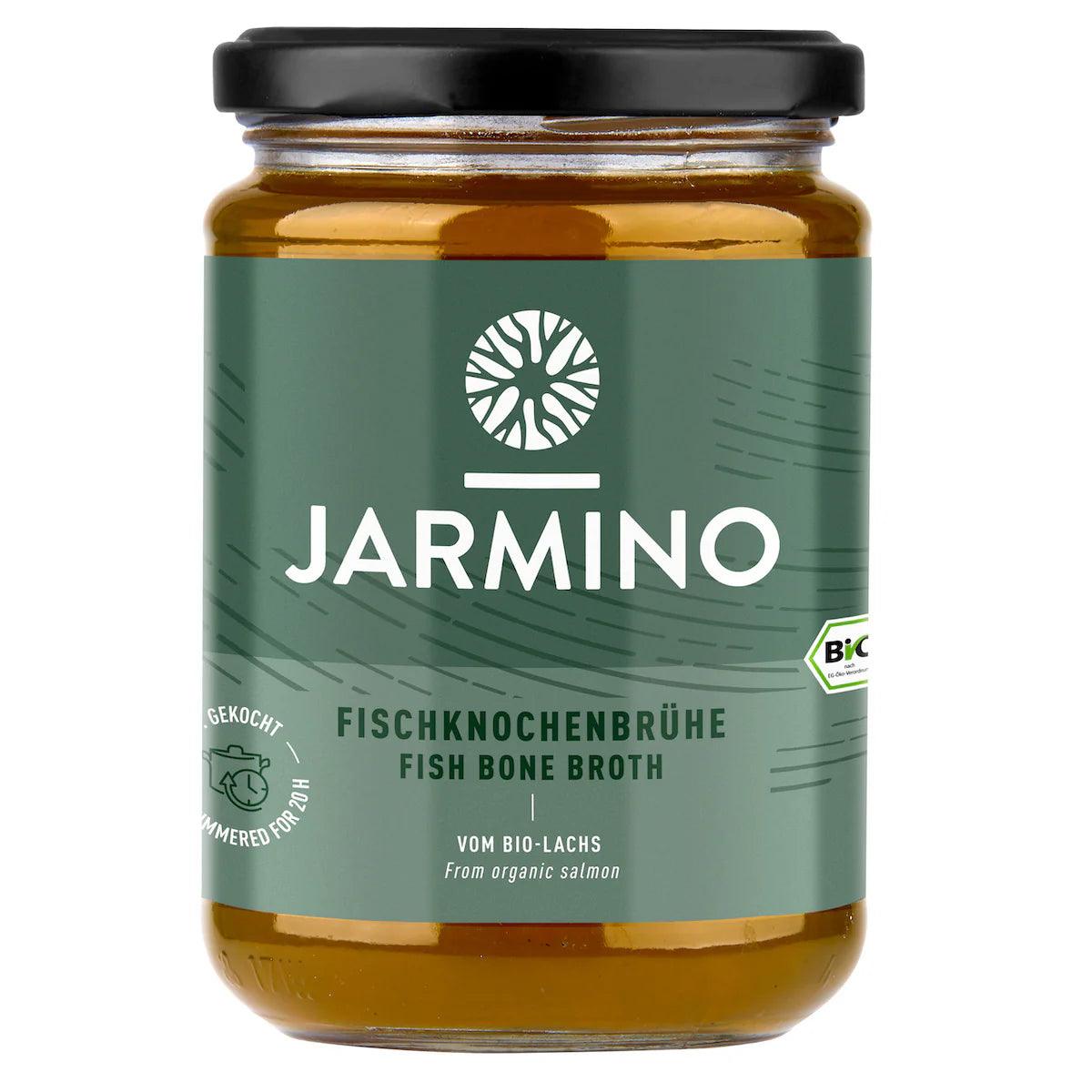 Jarmino organic salmon fish bone broth in a 350ml jar, featuring collagen-rich salmon and mineral broth with visible fish bones inside.