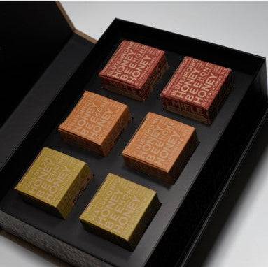 Luxury LV Natural Foods superfood gift box with a variety of natural health products arranged in an elegant presentation.