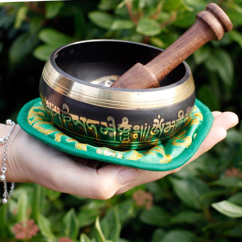 Green Tara singing bowl set by AW Gifts, 10cm, 380g, used as a spiritual or meditation drink accessory.