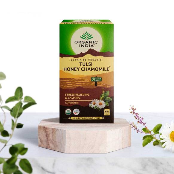 Organic India BIO Tulsi Honey Chamomile Tea bag featuring caffeine-free herbal tea with chamomile and tulsi in a box.