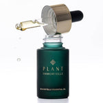 Bottle of PLANT IMMORTELLE Immortelle Essential Oil for skin care, with a clear label and amber glass container.