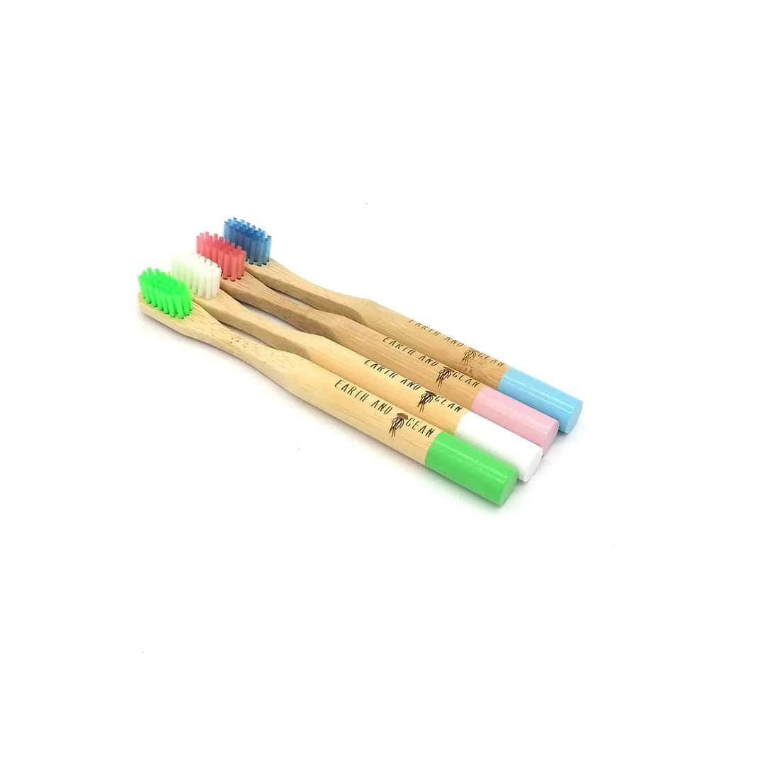 Set of two eco-friendly bamboo kids' toothbrushes from OLD PRODUCTS, featuring colorful ocean-themed handles in the Kids Edition Pack.