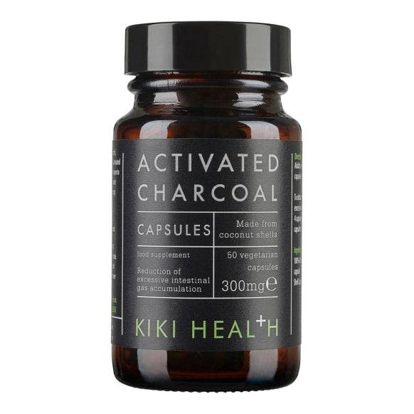 Kiki Health Activated Charcoal supplement in 50 vegetarian capsules, showing black capsules in a container.