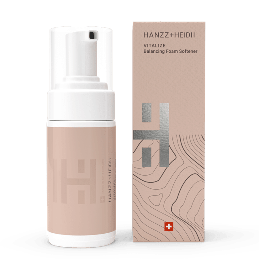 Zinzino VITALIZE Foam Softener bottle, 100ml, skincare product with a white pump dispenser and clear label, on a white background.