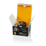 Open box of MountainDrop Herbalistas 100% pure natural Mumijo Shilajit resin, showing the resin inside a 65g container.