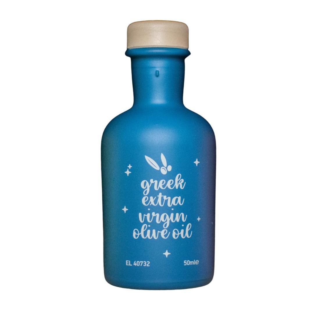 Elixir Flavours Anemelia olive oil 50ml bottle, clear glass container with black cap and label, on white background.