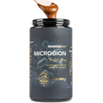 Herbalistas MountainDrop MICROBION supplement in a 600g natural blend for gut health, showing the product packaging and scoop.