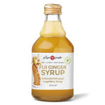 Organic ginger syrup from Herbalistas, showcasing a 237ml bottle with vibrant ginger root and natural syrup in a clear glass.