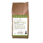 Whole beans of Herbalistas BIO Shiitake Mushroom Coffee Rå Hygge, 1kg, showcasing the dark roasted coffee beans with shiitake mushroom flavor
