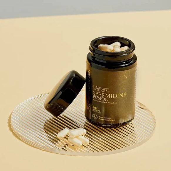 Herbalistas Liposomal Spermidine Fusion supplement capsules in a bottle, vegan dietary supplement for health and longevity.
