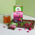 Organic India BIO Tulsi Sweet Rose herbal tea in a box with 25 infusion bags, featuring dried rose petals and tulsi leaves.