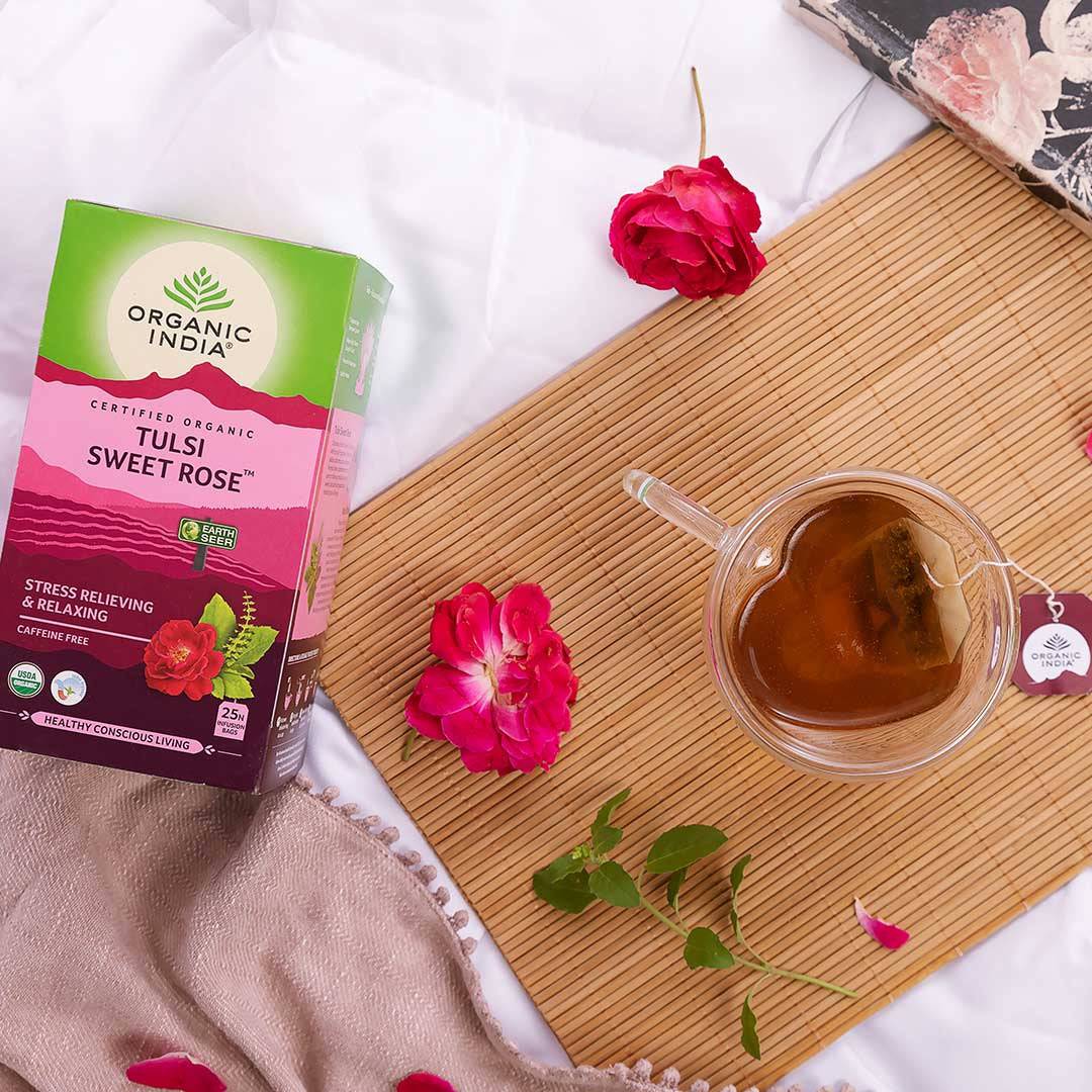 Organic India BIO Tulsi Sweet Rose herbal tea in a tea bag, featuring a fragrant rose aroma and caffeine-free infusion.