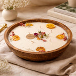 Velarte Grande soy wax candle in a wooden bowl with a natural wick, showcasing a warm, minimalist design.