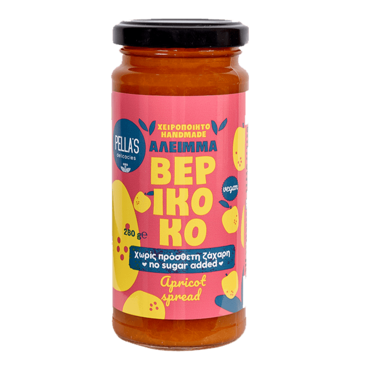 Pella's Delicacies Apricot Spread jar with a spoon, displaying smooth apricot fruit spread on a white background.