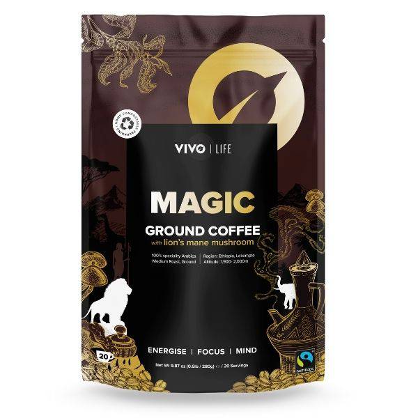 Vivo Life Magic Organic Coffee with Lion’s Mane mushroom in a coffee cup, showcasing a rich, dark brew with fresh coffee beans.