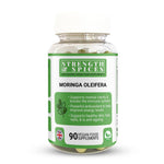 Bottle of Moringa Oleifera 700mg supplement capsules by Strength & Spices, shown in a clear container with capsules inside.